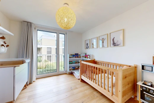 zimmer / schlafzimmer mit gipskartonwand, drywall, außenzugang, holzfußboden, und wood finish floor