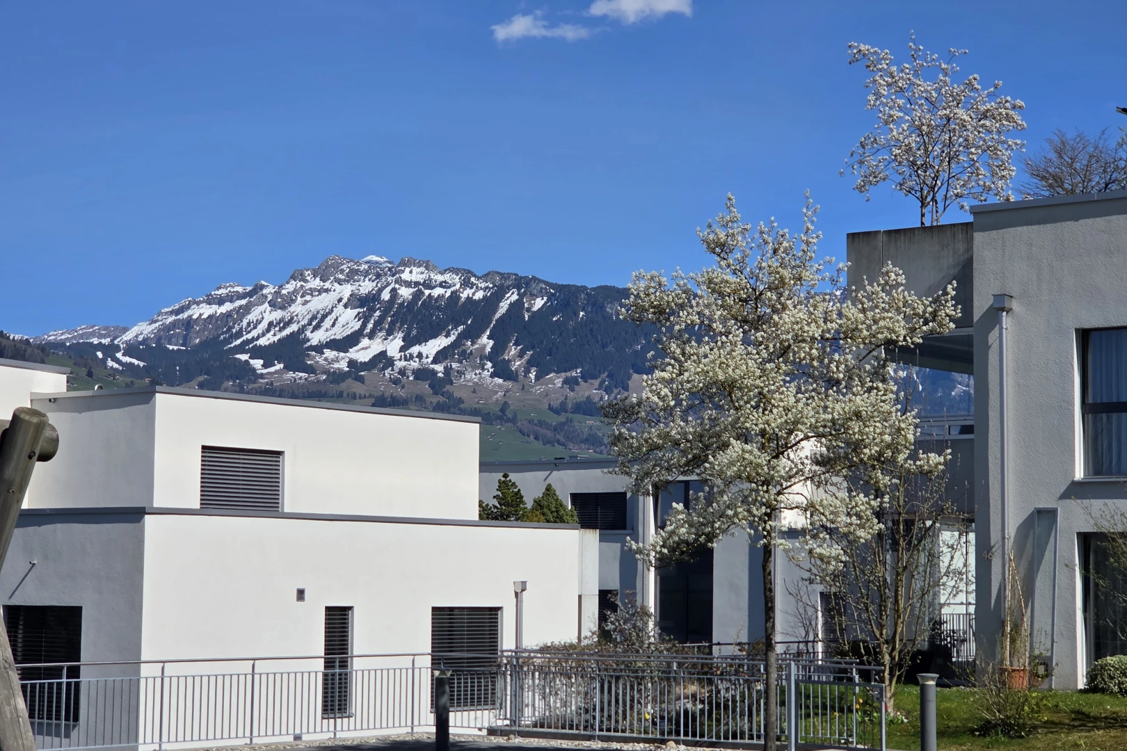 view of property featuring stucco siding and a mountain view
