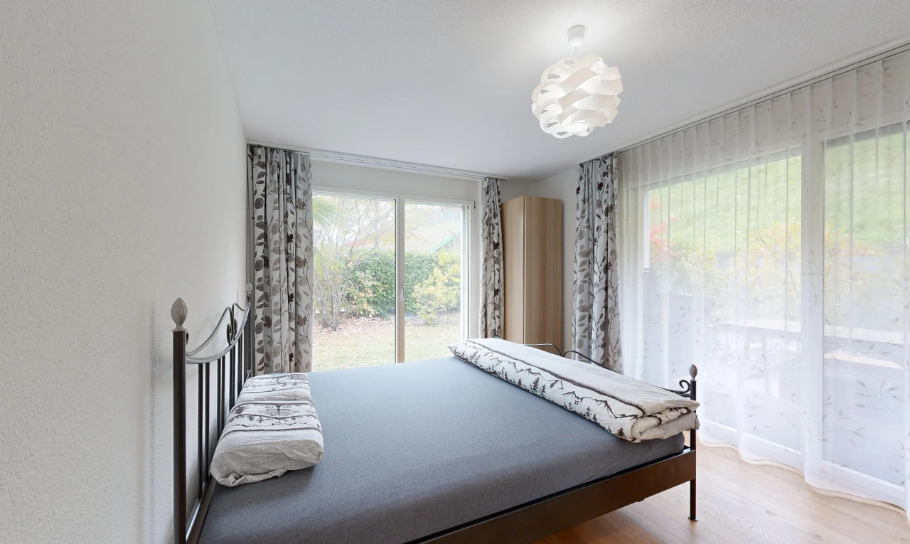 room / bedroom with light wood-style floors