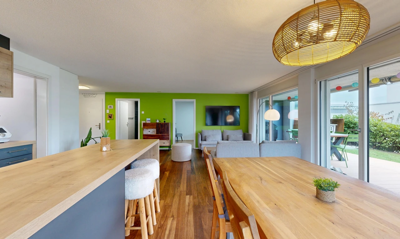dining space with hanging light fixtures, access to outside, and dark wood finished floors