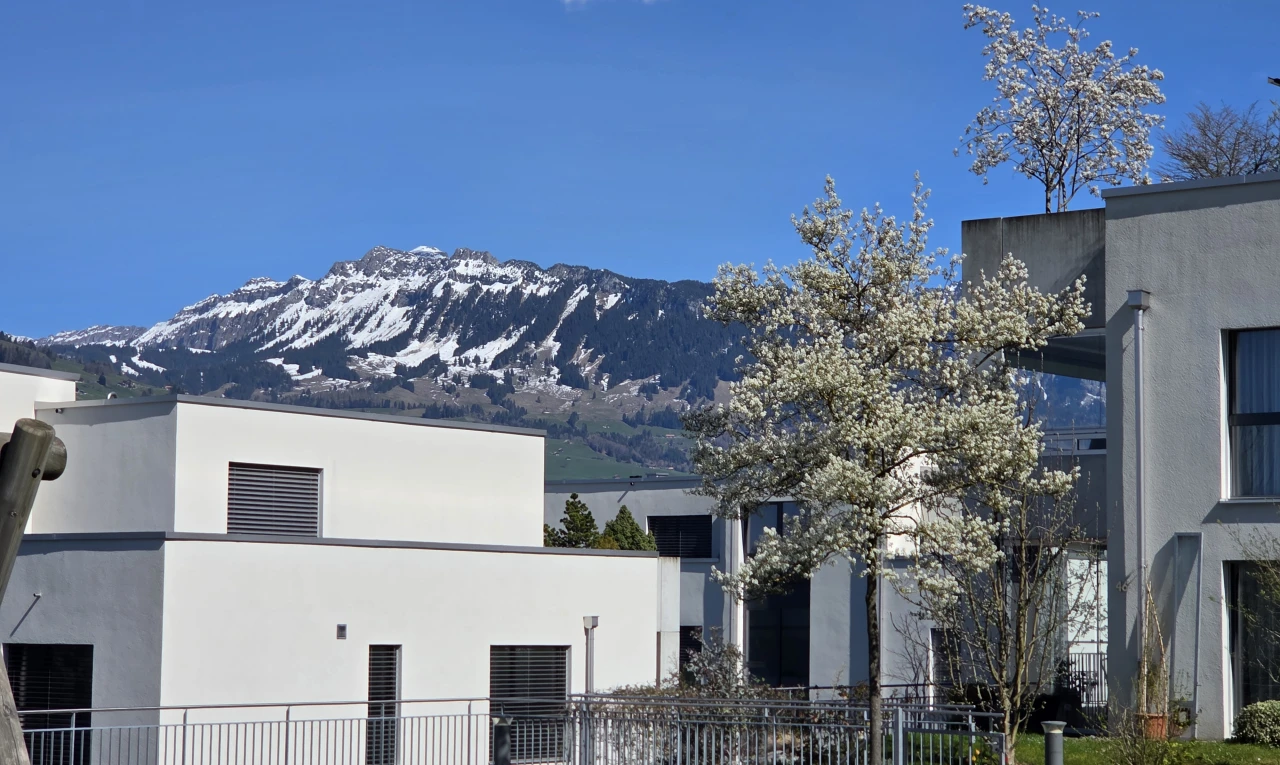 view of property featuring stucco siding and a mountain view