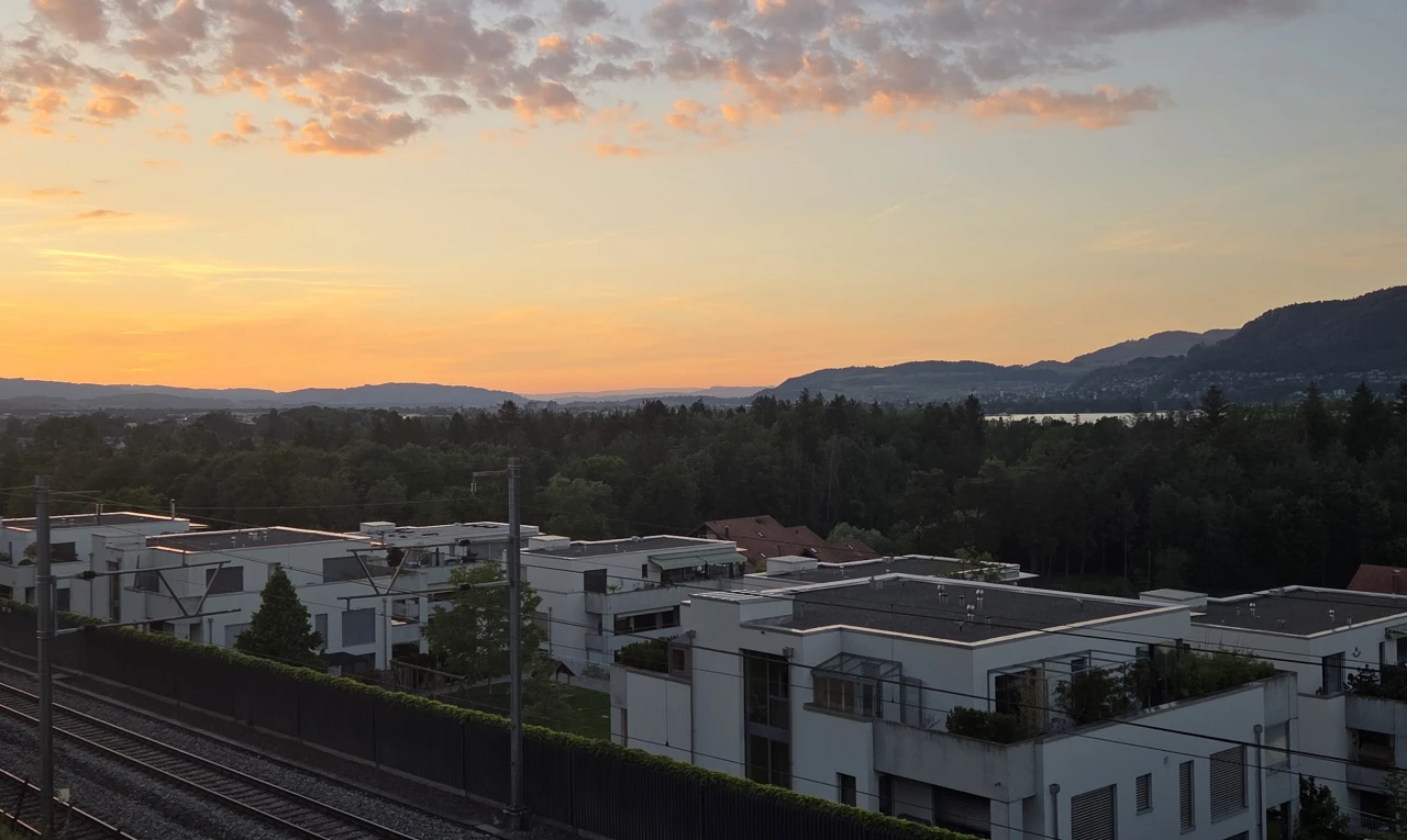 property at dusk featuring a mountain view
