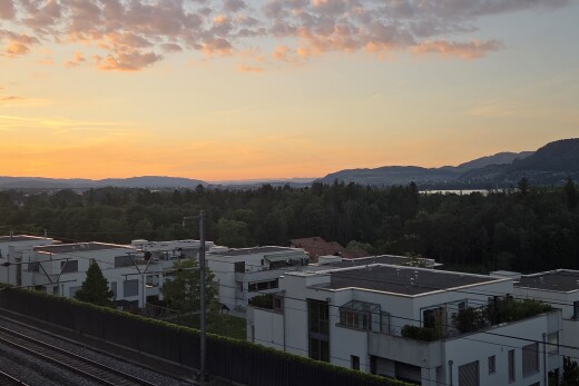 property at dusk featuring a mountain view