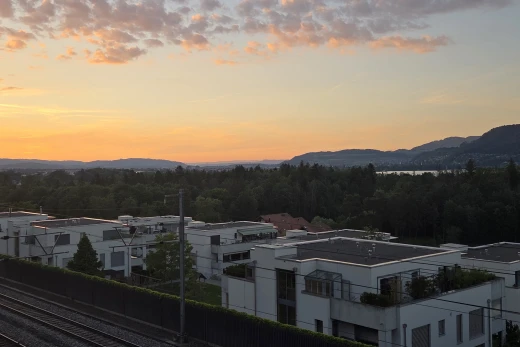 property at dusk featuring a mountain view