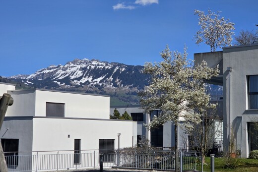 view of property featuring stucco siding and a mountain view