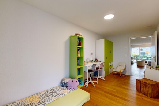 room / bedroom featuring light wood-style flooring and recessed lighting