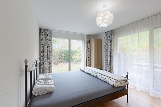 room / bedroom with light wood-style floors