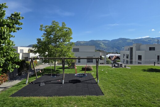 exterior space with a mountain view and a patio area