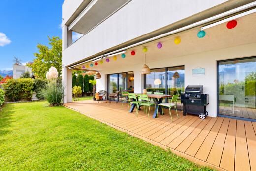 view of wooden deck with area for grilling and outdoor dining area