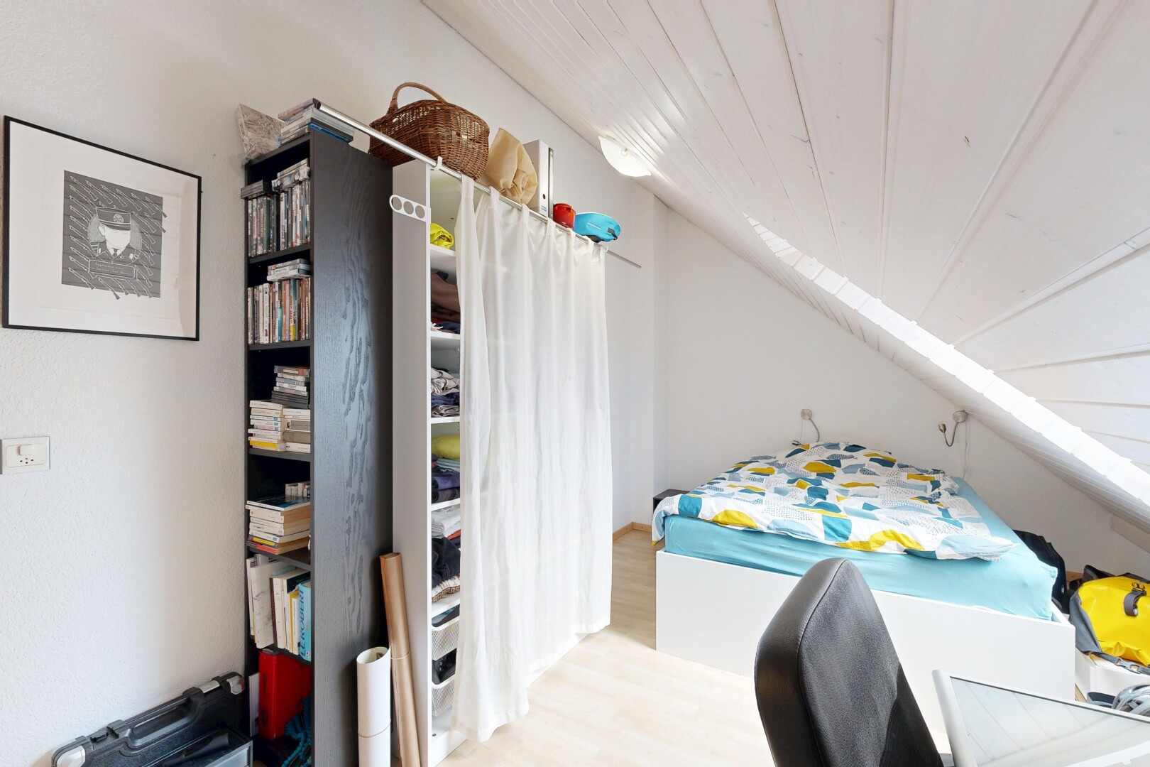 room / bedroom featuring light wood-style flooring and a vaulted wooden ceiling