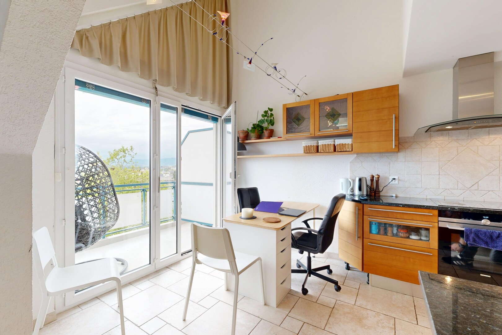 office space featuring light tile patterned flooring and built in study area