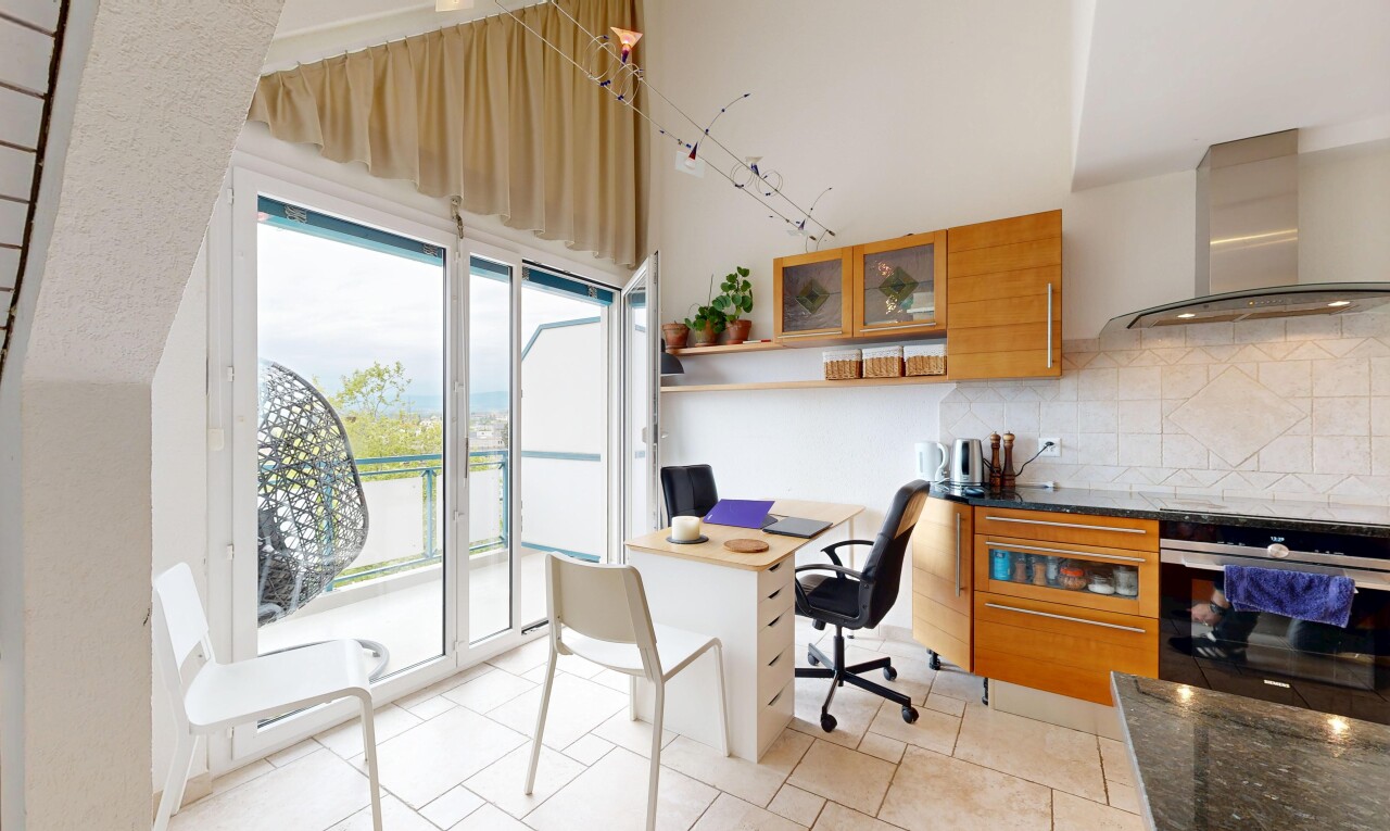 office space featuring light tile patterned flooring and built in study area