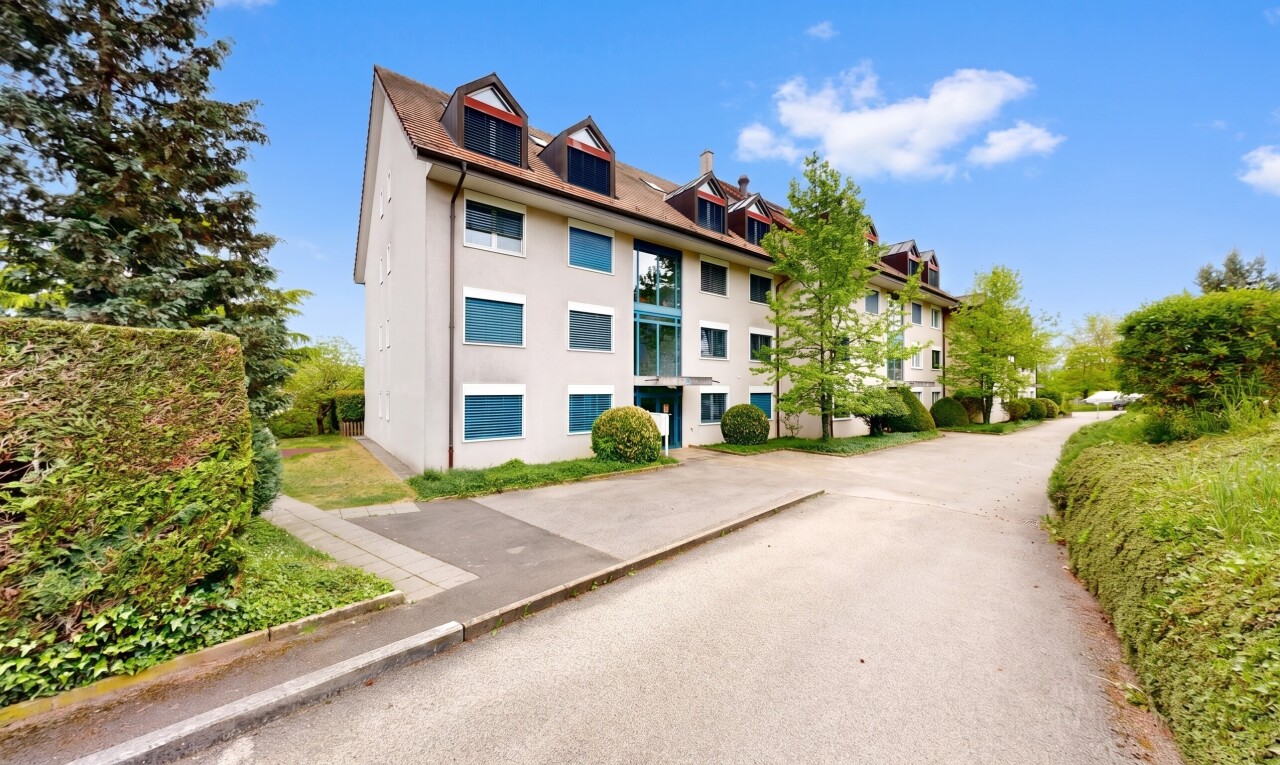 view of home with stucco siding