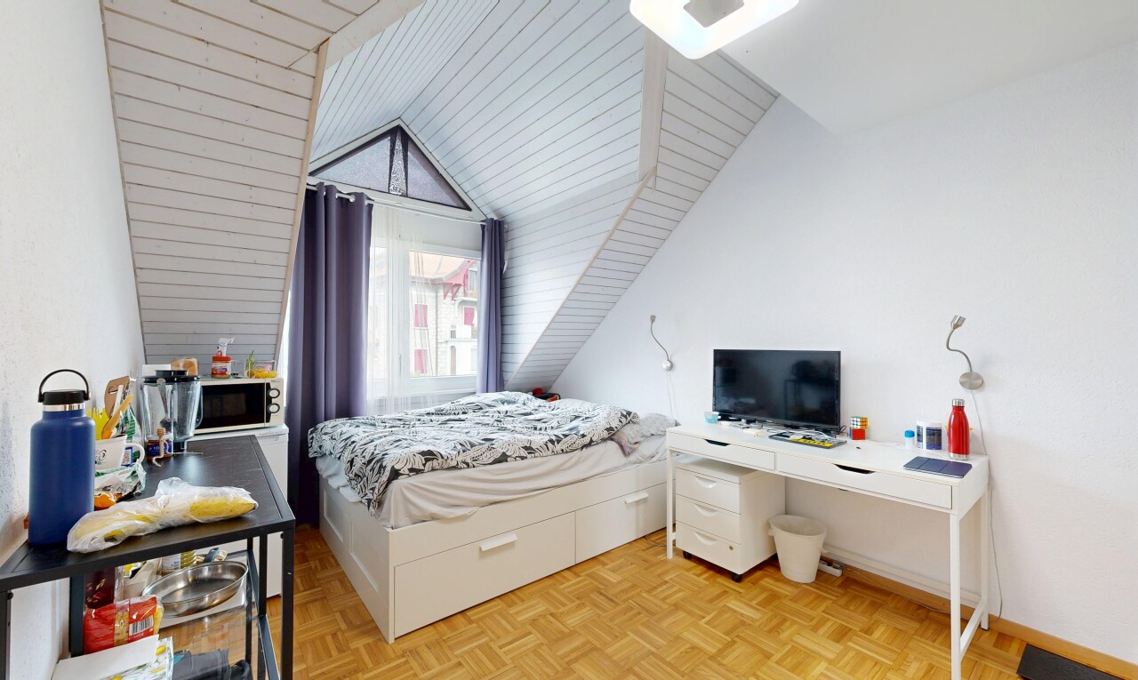 room featuring parquet floors, a vaulted wood ceiling, and an office area