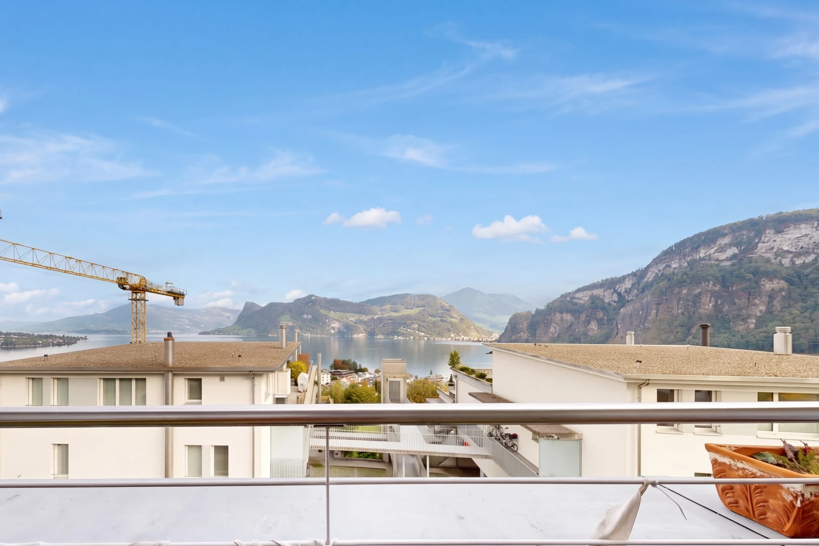 view of property featuring a water and mountain view