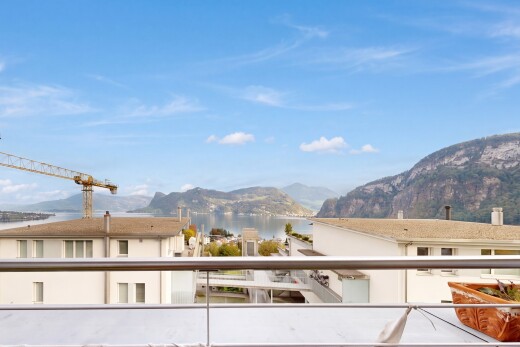 view of property featuring a water and mountain view