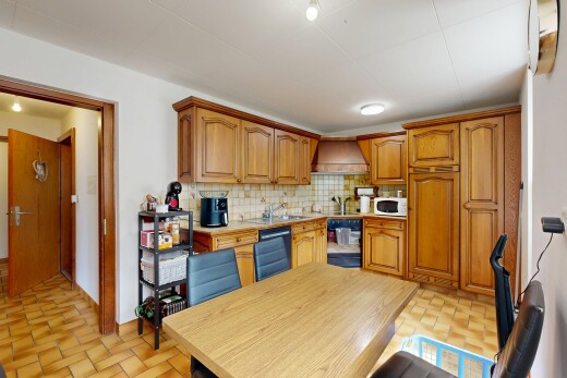 cuisine avec light floor, armoires en arc, arched cabinets, wood edge countertops, et inside property