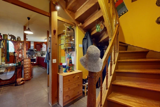 stairway with tile patterned flooring