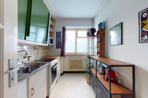 küche mit natürliches licht, natural light, offene regale, kühler, und inside property