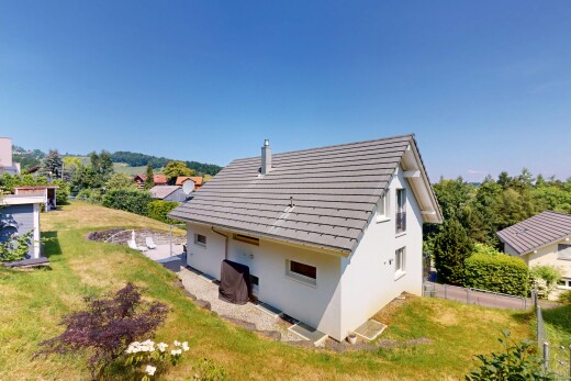 außenansicht mit day time, property visible, stuckverkleidung, und rasen