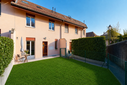 view of home featuring a tile roof, stucco siding, and a patio