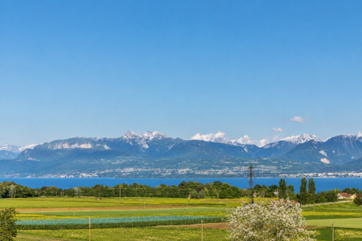 view of mountain background with a large body of water