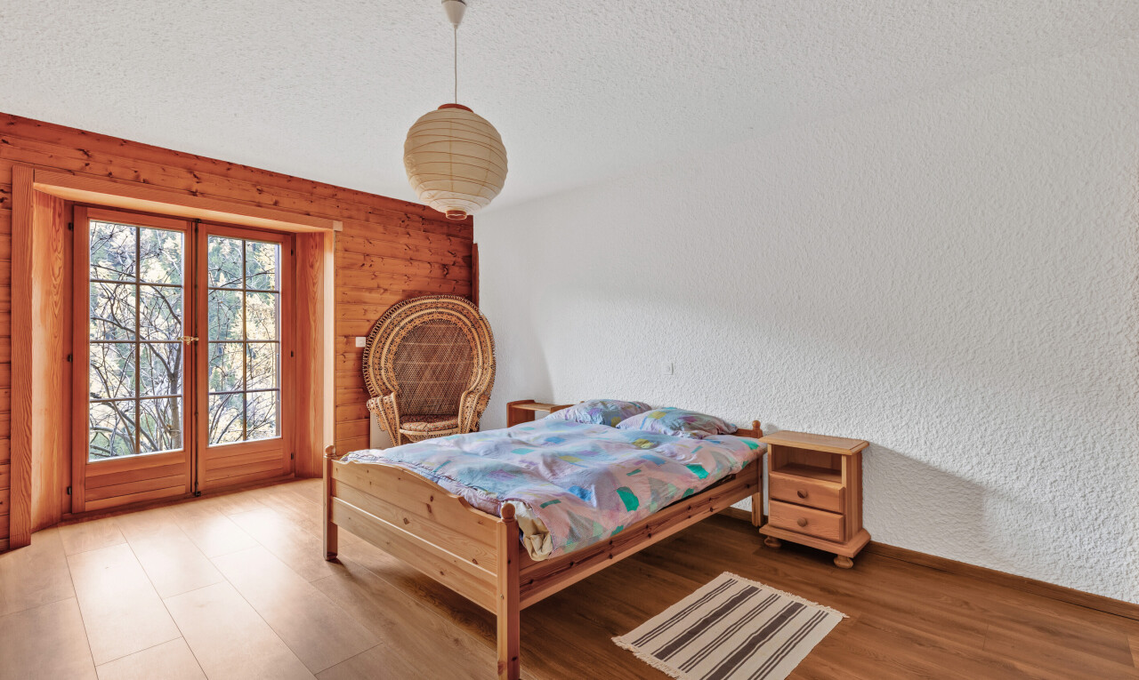 zimmer / schlafzimmer mit strukturierte wand, textured wall, inside property, spritzputz decke, und textured ceiling