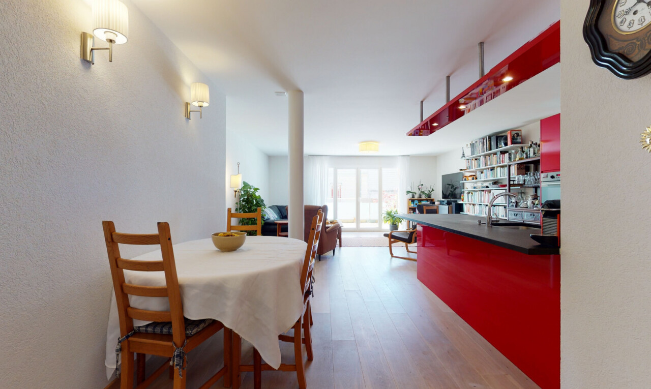 dining room featuring light wood-style floors and a sink