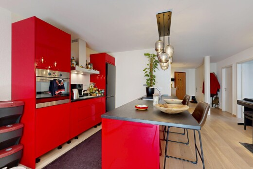 salle à manger avec inside property, cloison sèche, drywall, évier, et sol en finition bois
