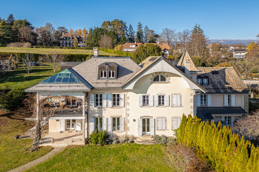 view of home featuring a lawn and a patio