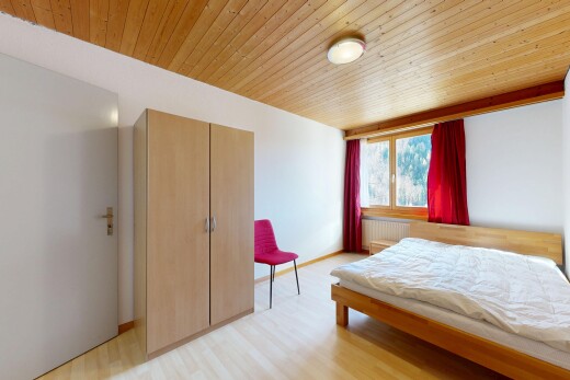 zimmer / schlafzimmer mit inside property, gipskartonwand, drywall, natürliches licht, und natural light