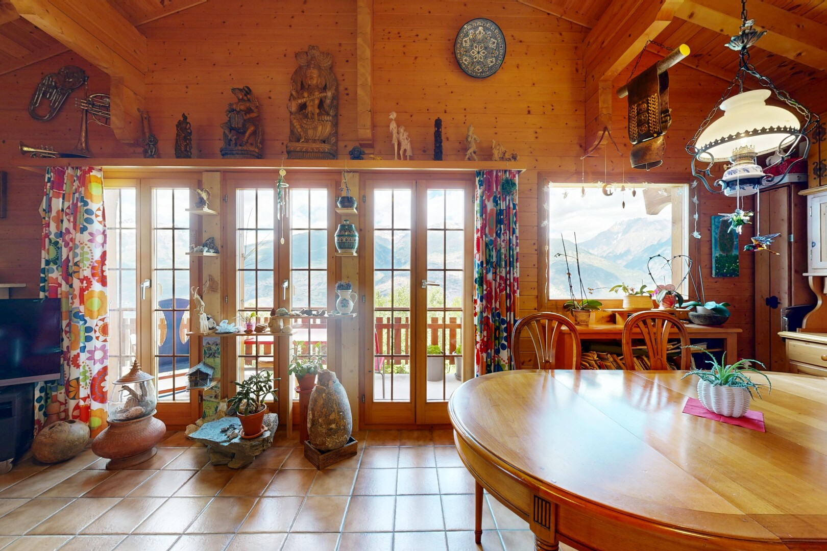 tiled dining room featuring lofted ceiling with beams, french doors, and wood walls