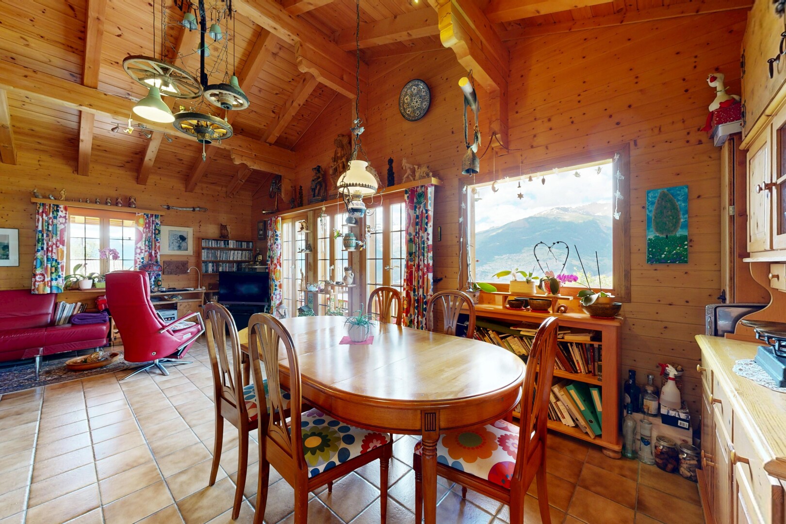 dining space featuring wooden walls, lofted ceiling with beams, light tile patterned floors, and wooden ceiling