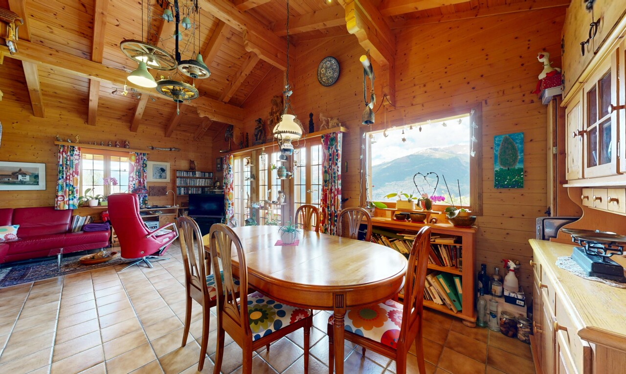 dining space featuring wooden walls, lofted ceiling with beams, light tile patterned floors, and wooden ceiling