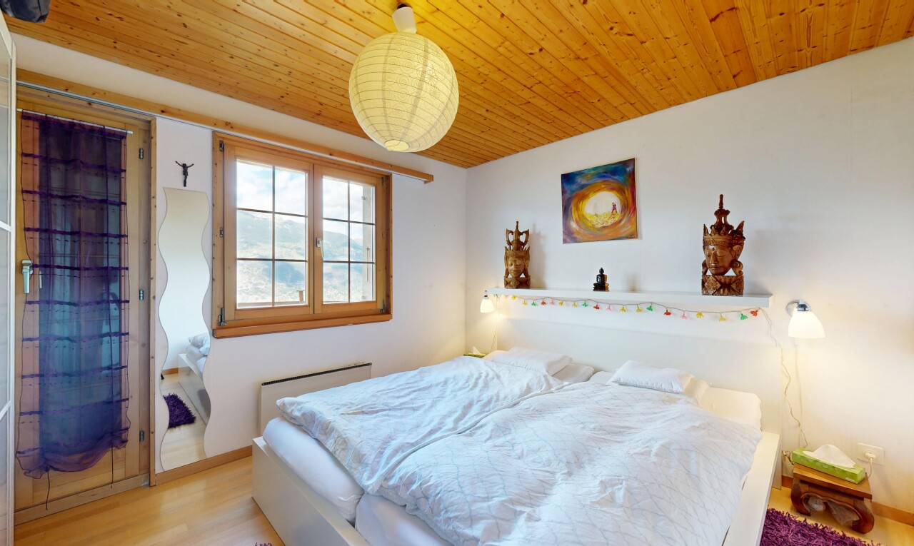 room featuring light wood-style floors and wood ceiling