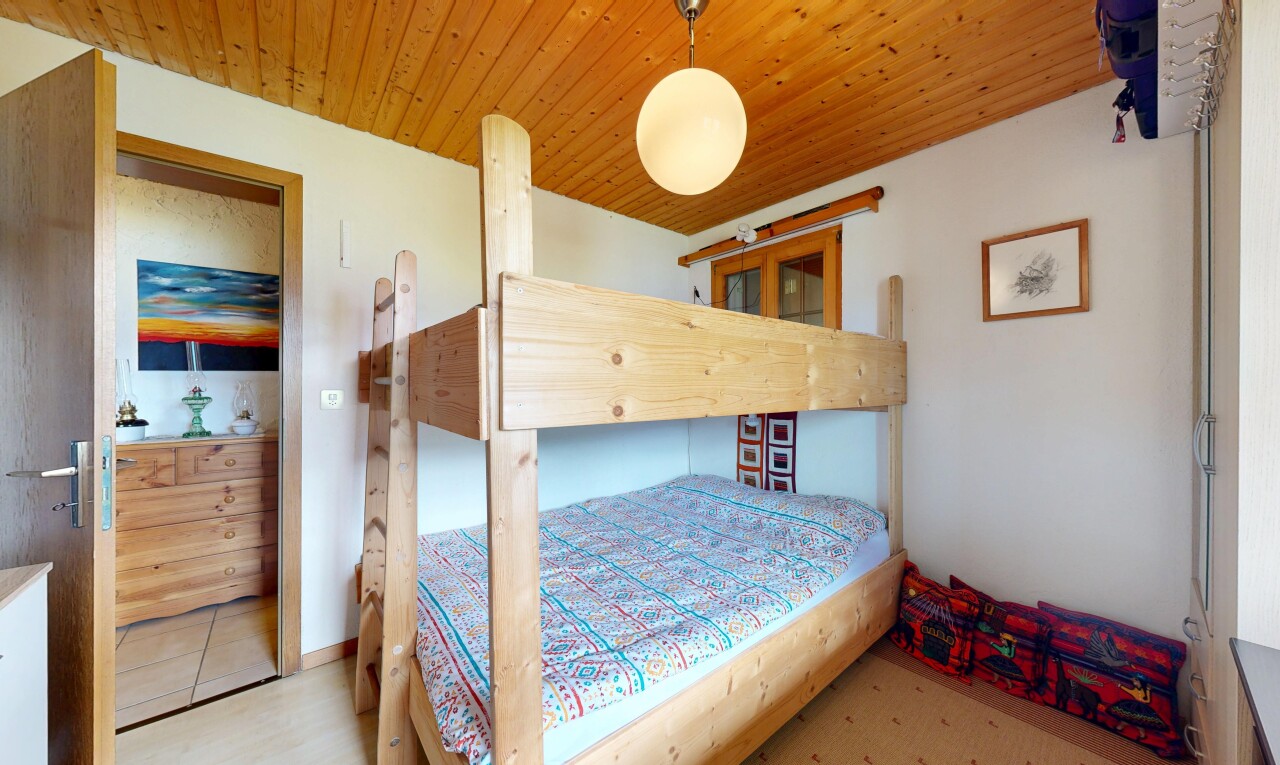 room with wooden ceiling