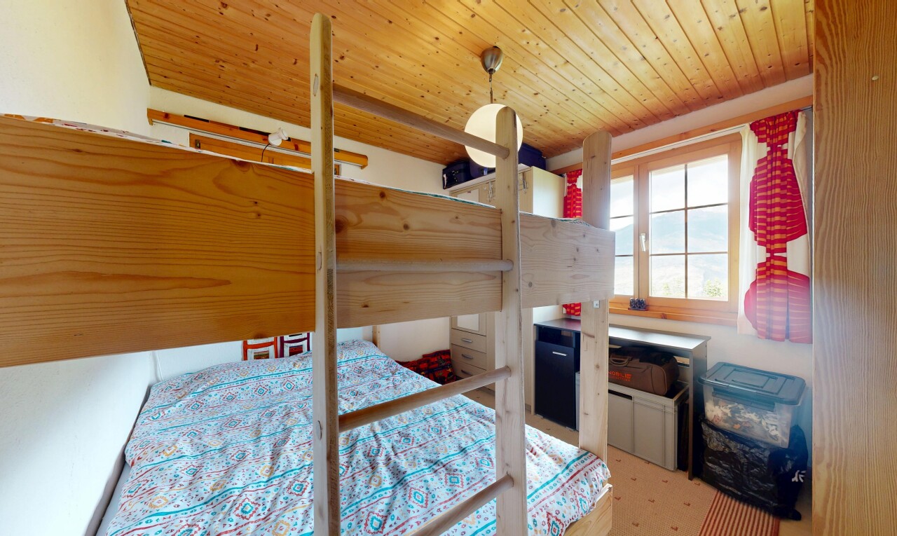 room with wooden ceiling