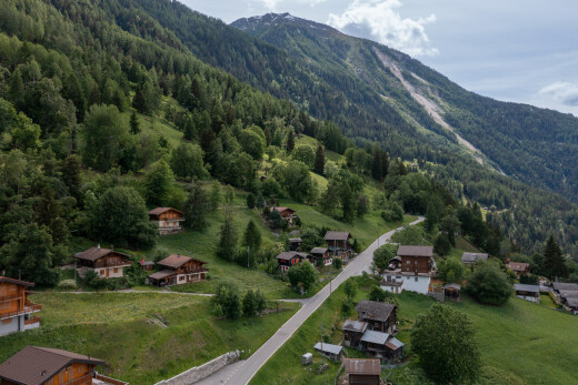 view of mountain background featuring a forest