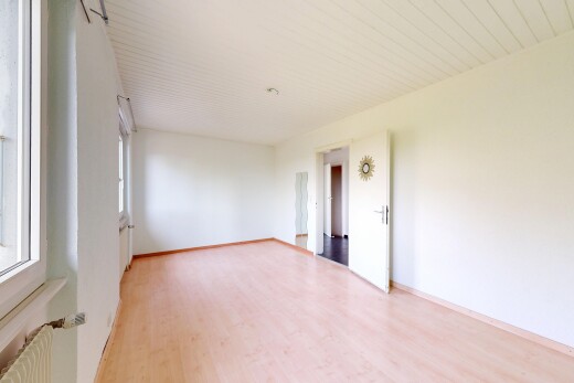 pièce vide avec sol en finition bois, wood finish floor, cloison sèche, drywall, et inside property