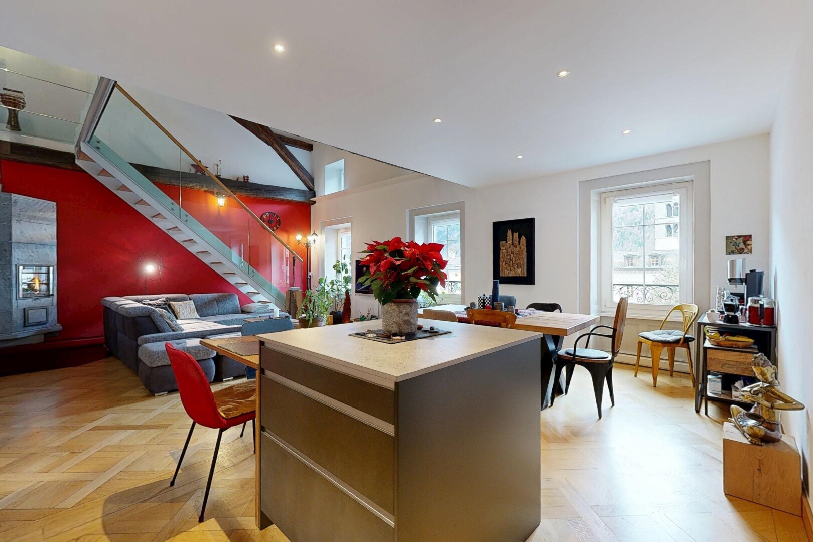 kitchen featuring light countertops, a center island, recessed lighting, and open floor plan