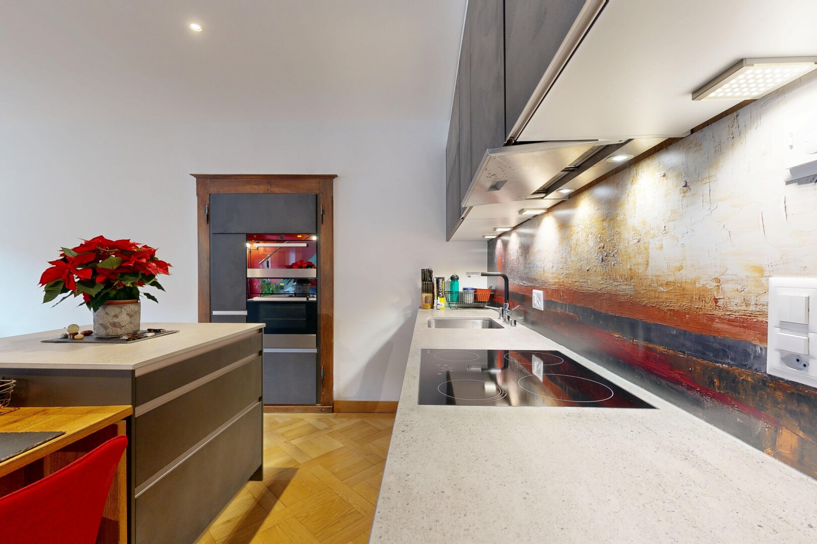 kitchen featuring black electric cooktop and modern cabinets