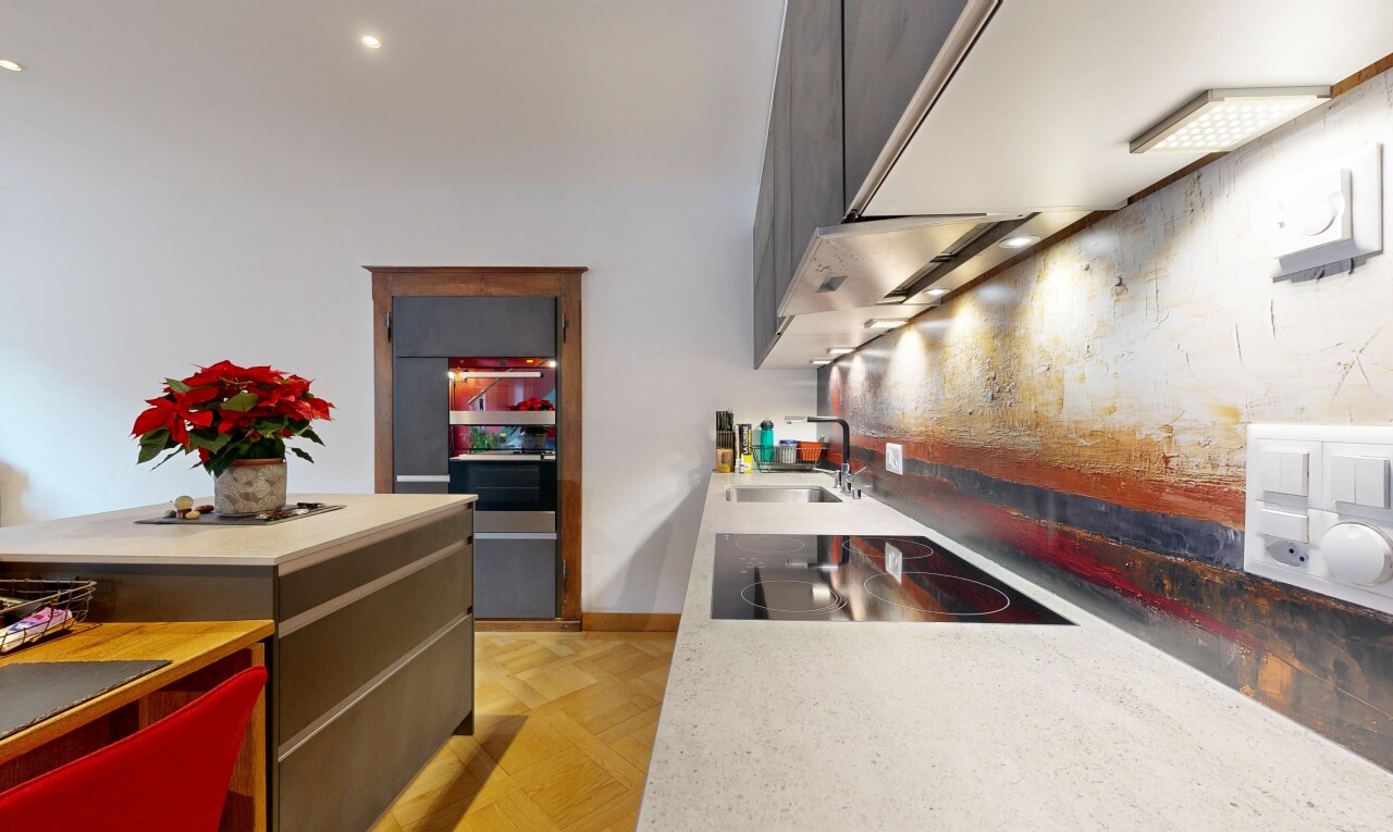 kitchen featuring black electric cooktop and modern cabinets