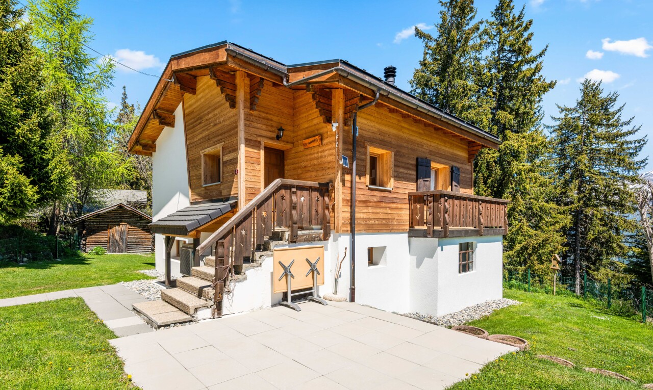 view of home with a lawn, a patio area, and stucco siding