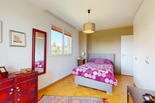 room / bedroom featuring light parquet flooring