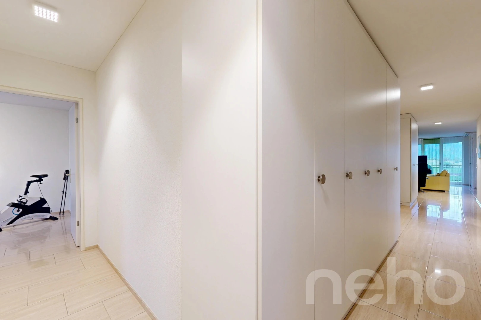 corridor with recessed lighting