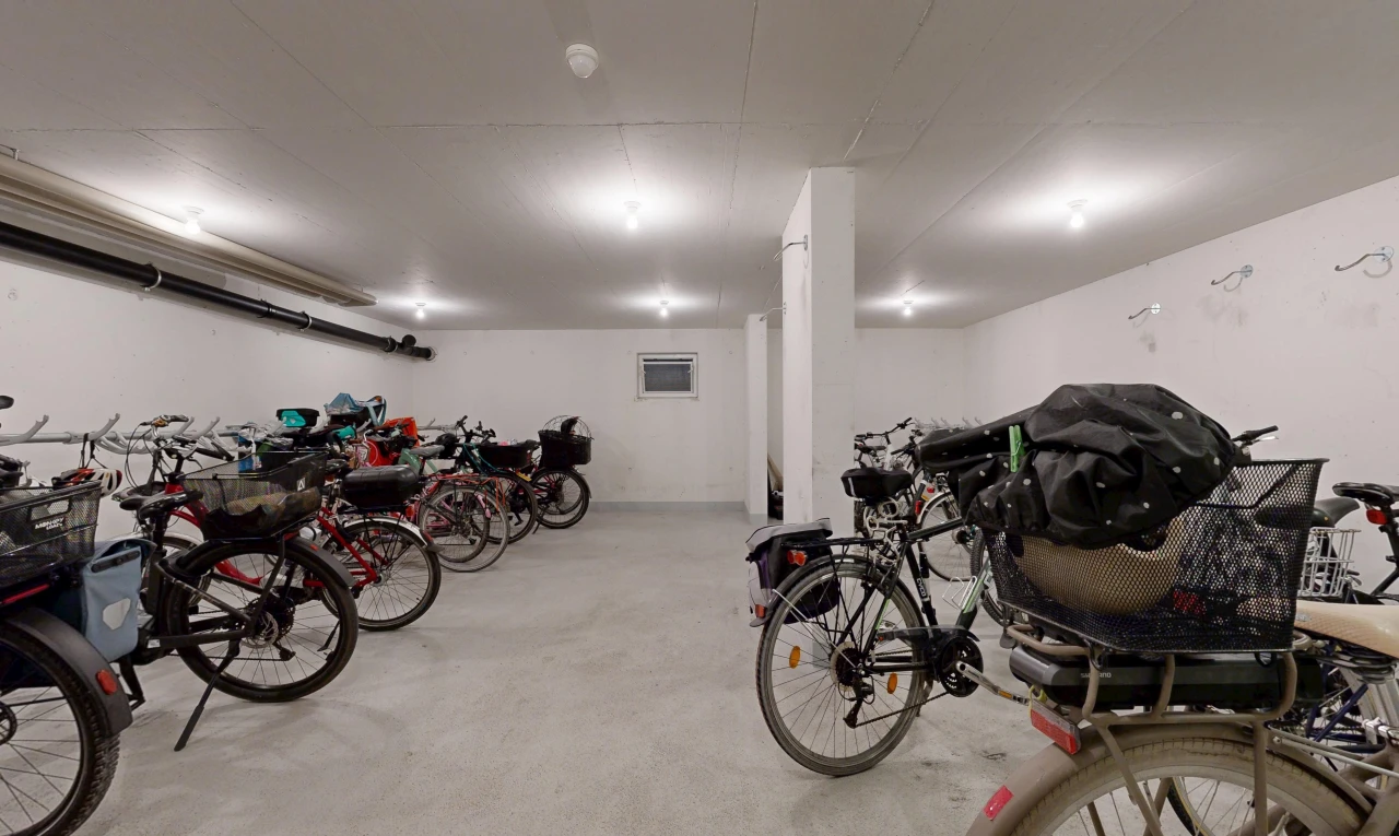 view of parking with bike storage