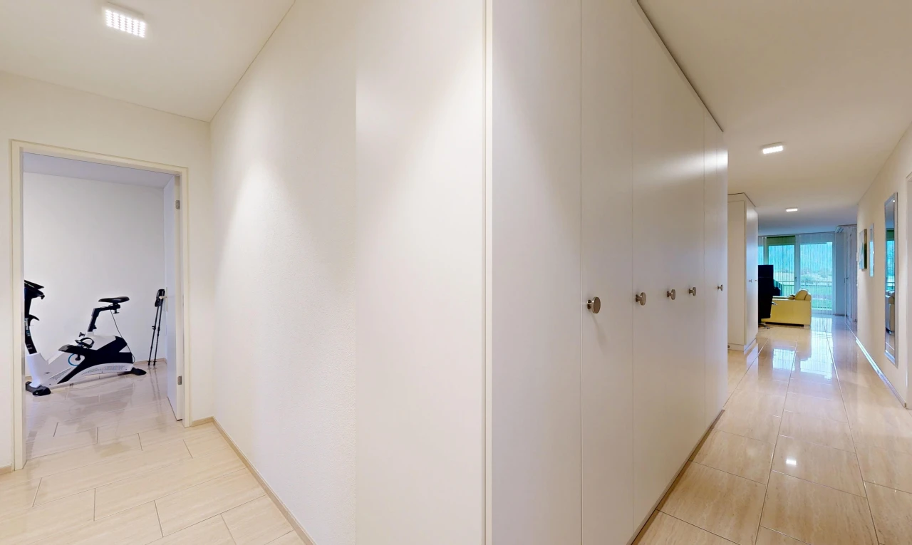 corridor with recessed lighting