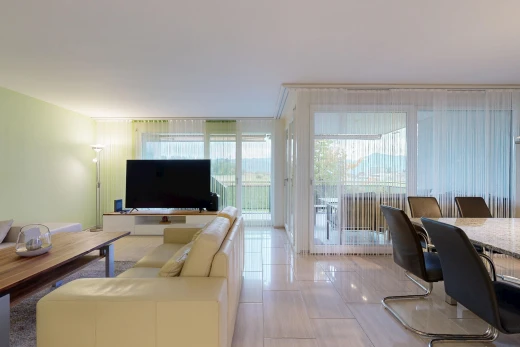 living room with access to exterior