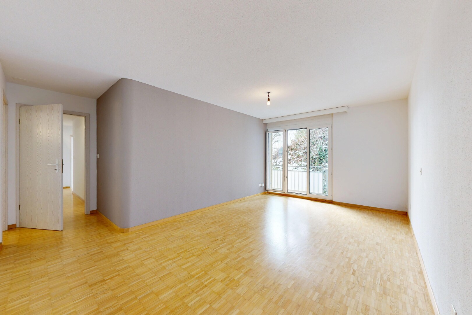spare room featuring light wood-style floors