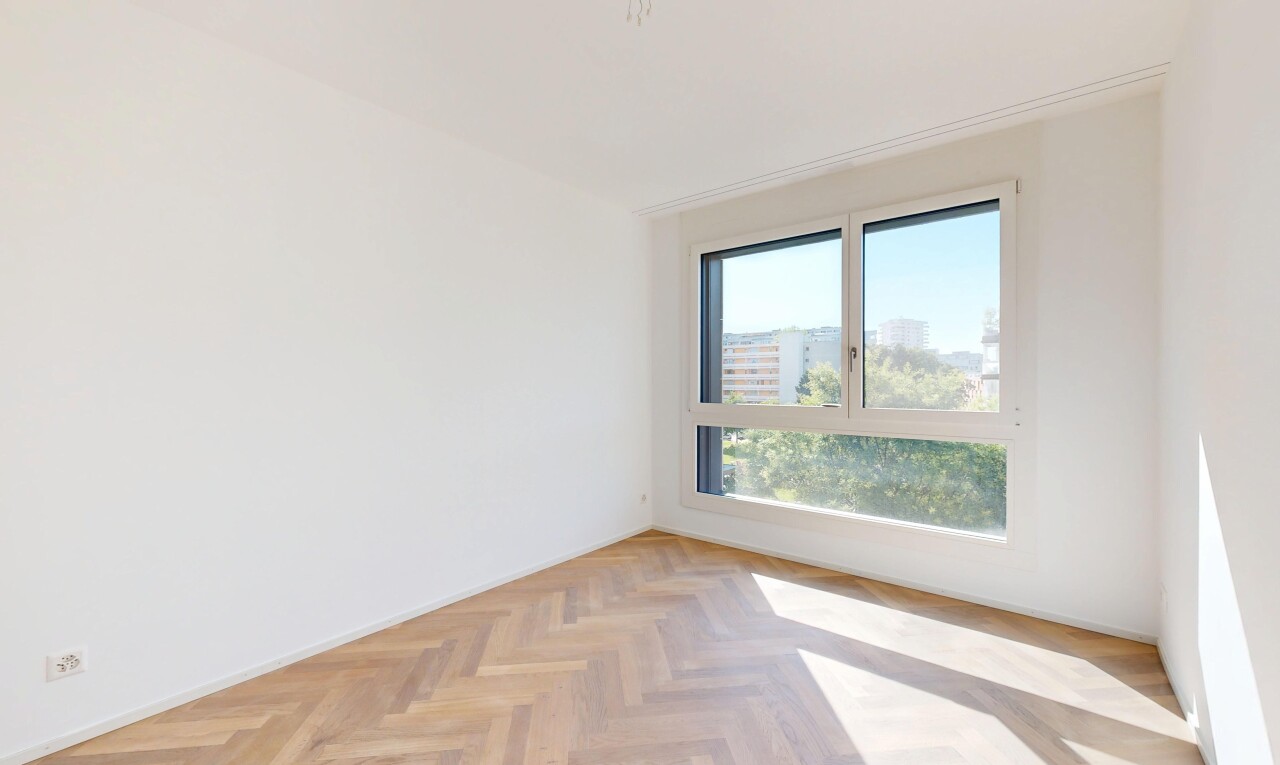 pièce vide avec day time, cloison sèche, drywall, inside property, et parquet floor